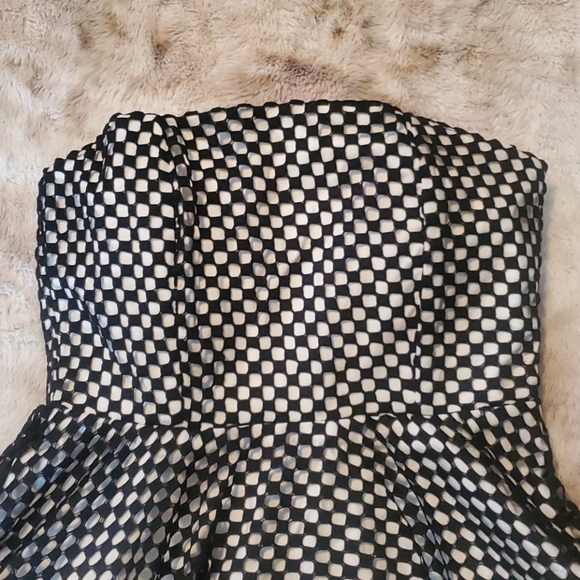 Asymmetrical checkered flared dress mesh overlay - Picture 2 of 6